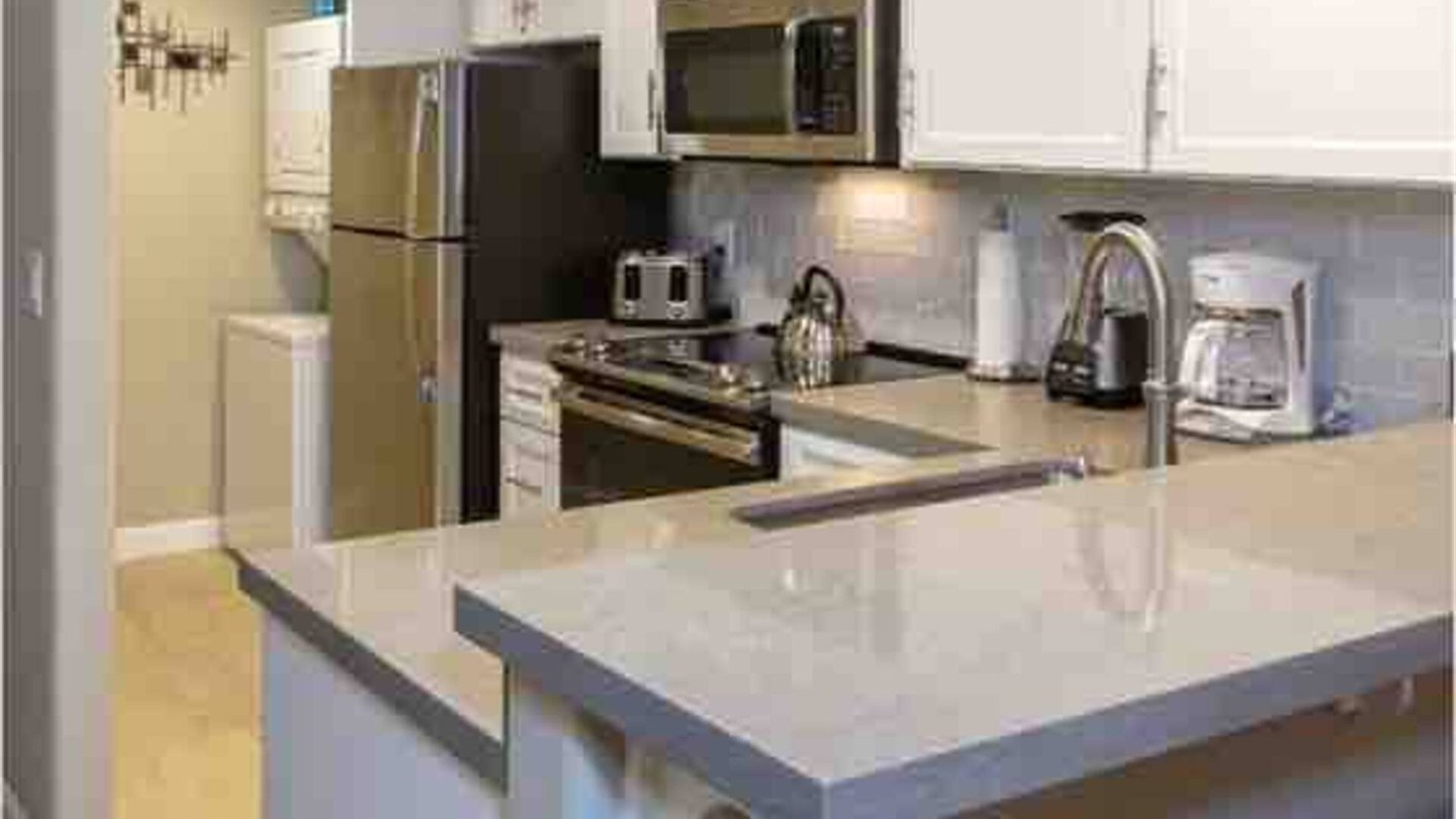 Updated Unit 52 kitchen and breakfast bar
