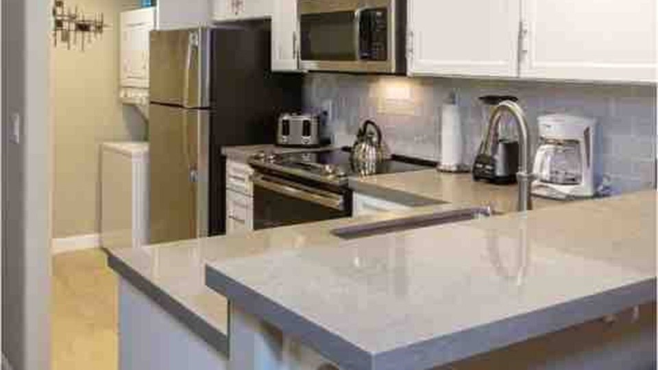Updated Unit 52 kitchen and breakfast bar