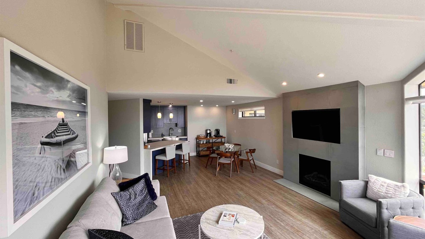 Bright Unit 75 living room and dining area