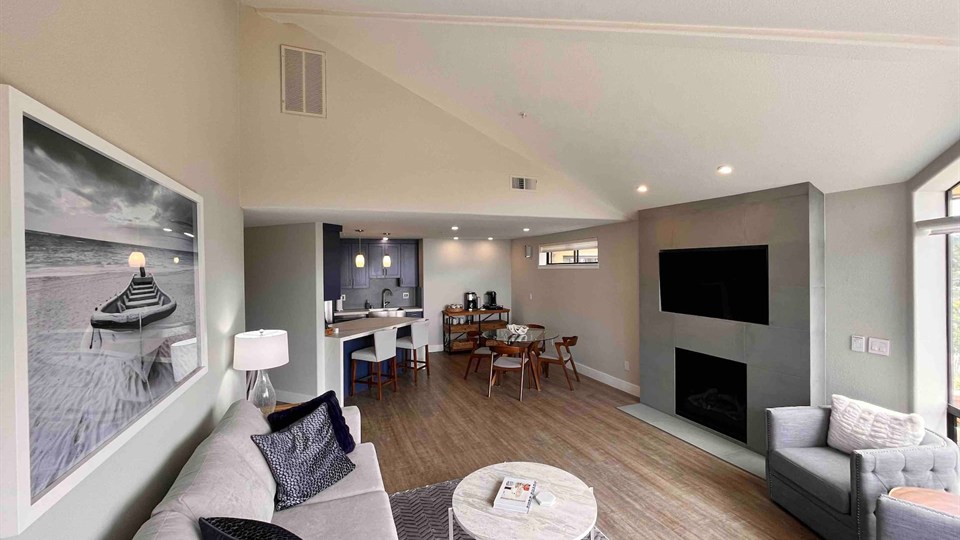 Bright Unit 75 living room and dining area